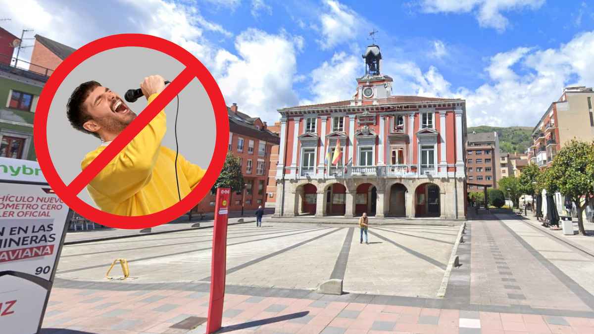 Ayuntamiento de Mieres con símbolo de prohibición de cantar tras la nueva norma a los trabajadores municipales