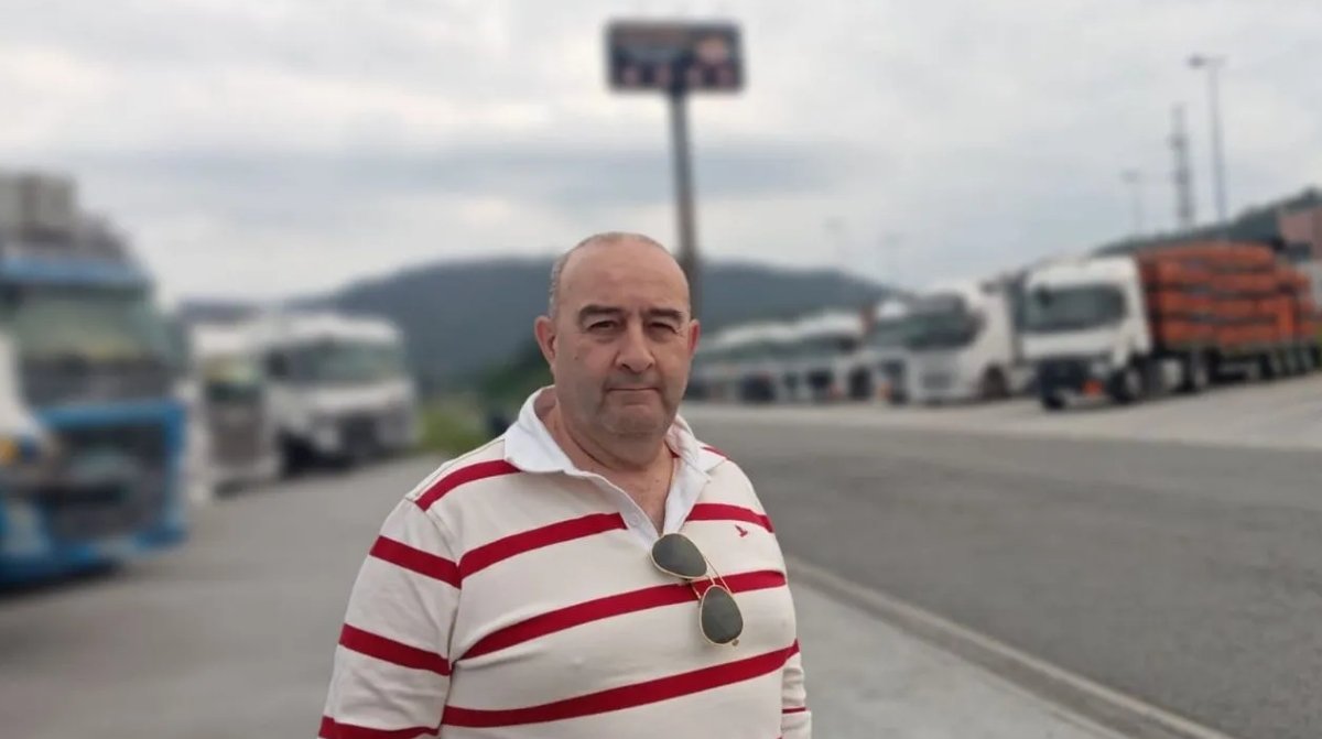 Luis Carnota camionero en área de descanso con camiones denuncia incumplimiento de descansos en el transporte