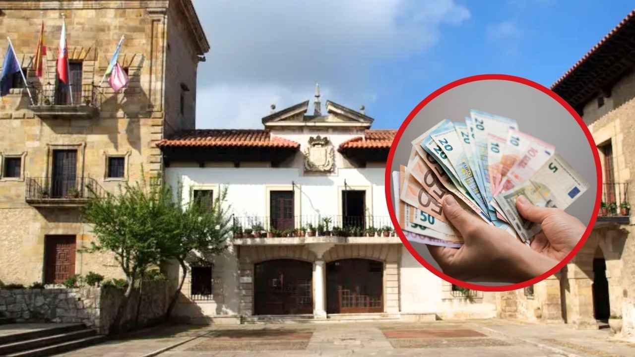 Fachada del Ayuntamiento de Camargo, en Cantabria, junto a una imagen de billetes de euro que ilustra las ayudas para guarderías.